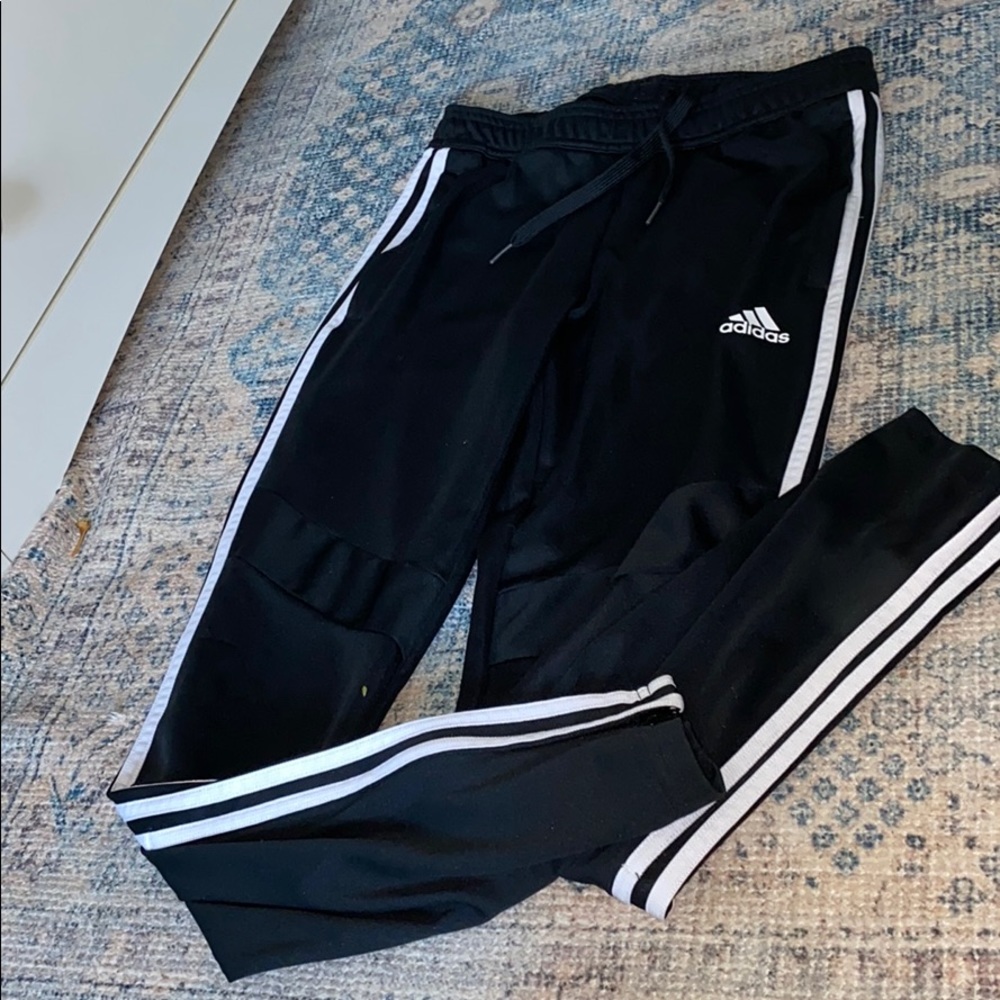 Black adidas sweat pants/ joggers.